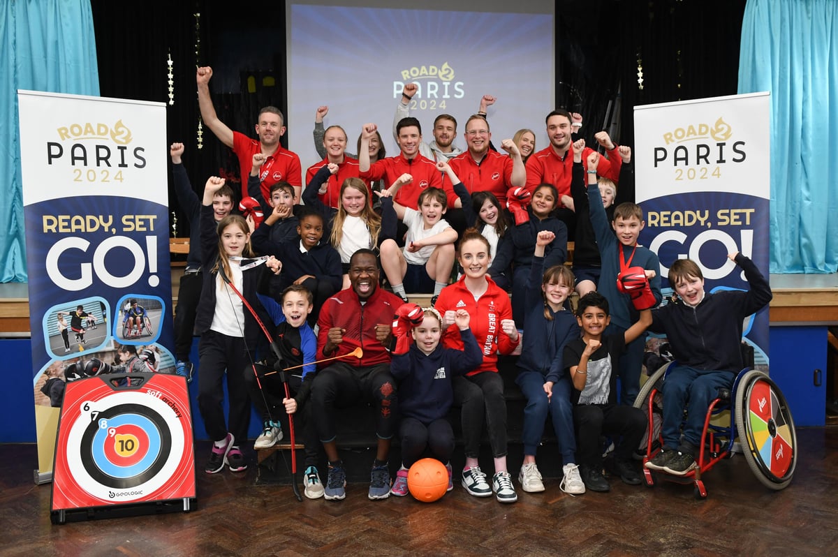 Olympian Sadam Koumi and Paralympian Siobhán Fitzpatrick, both front row, at Boldmere Junior School